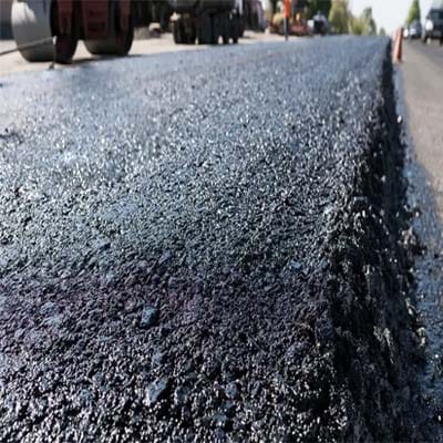 Close-up of freshly laid road surface using polymer modified bitumen (PMB) for enhanced strength and flexibility